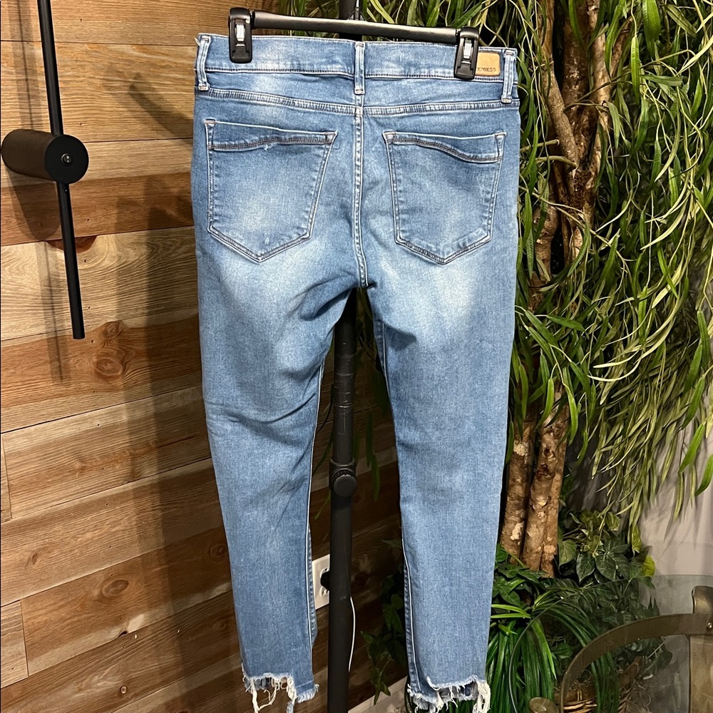 Express destructed mid rise skinny jeans. 10 - Picture 4 of 5